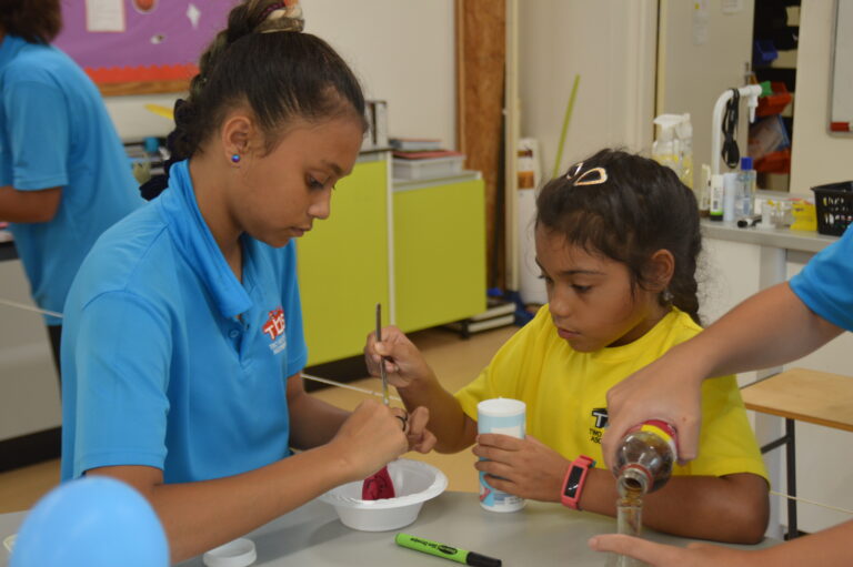 GIRLS ENJOYING SCIENCE